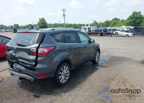 2017 Ford Escape Titanium z USA, uszkodzony, nr VIN 1FMCU0J97HUC12229